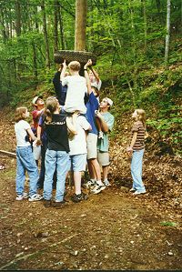 Group effort gets the tire over the pole setting a record.