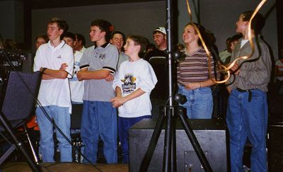 Youth watch and have a great time as Shaded Red Performs.