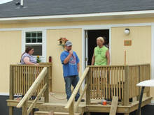 Joe Kidd accepts the keys to his family's new home.